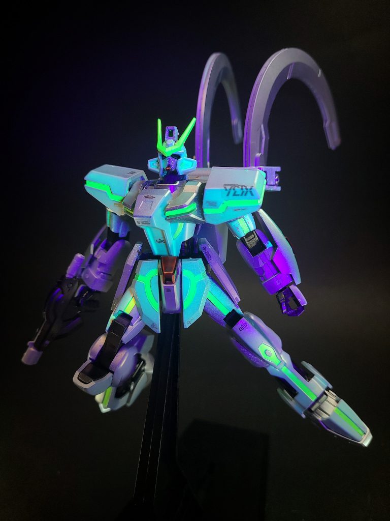 本体は地上、ヴォワチュール・ユニットはトロヤステーションでそれぞれ開発されており、ブレイク・ザ・ワールド事件の直後本体もシャトルで宇宙へ打ち上げられトロヤステーションで機体が完成。VLの稼働テストが行われ成功し、その後AIのデータ蓄積のためテストパイロットとしてソルとセレーネが搭乗した。しかし本機のAIユニットの情報に軍事転用の可能性を見出した地球連合軍がファントムペインを派遣。ユニット奪取のために攻撃を仕掛けてきたため、シビリアンアストレイに混じって本機もコクピットユニットに換装して出撃した(ちなみにこの時、セレーネは「Nジャマーキャンセラーが効いてるから核エンジンは使えない」と告げているが、誤りである)。