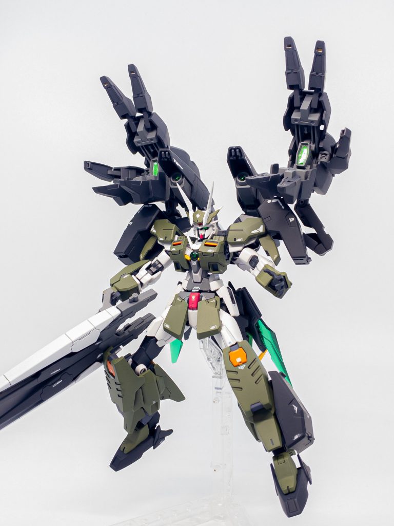 クアッドキャノンGNキャノンとGNビッグキャノンから放出される圧縮粒子をGNフィールドで収束して打ち出す。