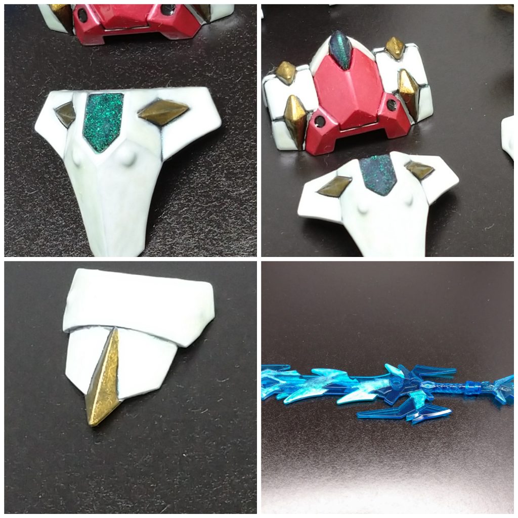 今回、鎧の白部を中心にミラーネイル(ダイソー製)と光沢トップコートを混ぜて仕上げ。下地は白と中心の宝石のような部分には黒を使用。