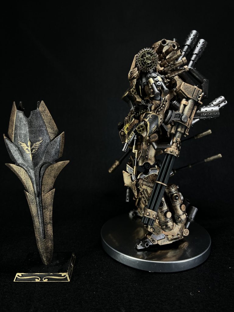 側面からスチームパンク表現その②、歯車です。歯車全部見せの部分は少しにし、パーツの隙間に配置したり、金属ニッパーで半分に切ったりして、ただ歯車をつけてスチームパンクっぽいー!ってならないように、一つ一つ意味を持たせるように設置しようと意識しました。