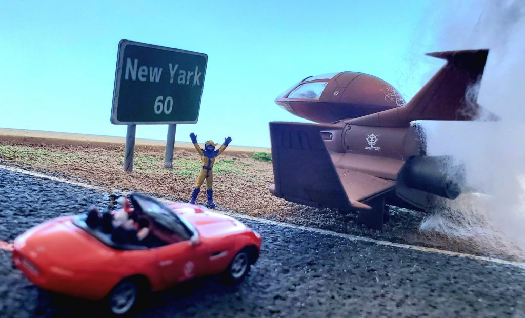 ジオラマは100均のコルクボードと粘土で作成。標識はプラバンに印刷した紙を張り付けました。