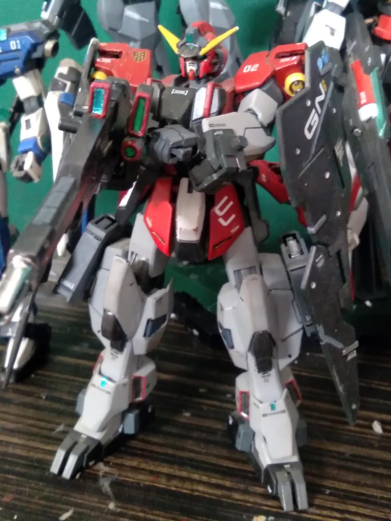 This is my favorite one. It's called the GN-R2 Gundam Antares. It's the sharpshooter of the group. It also is equipped with the gn lightning rifle,gn pistols, gn shield bits,and the gn full shield
