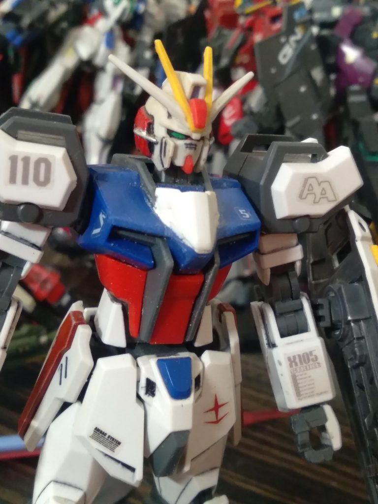 The strike is pretty standard so far. I have added and shaped the white part from 00 gundam to the chest of strike