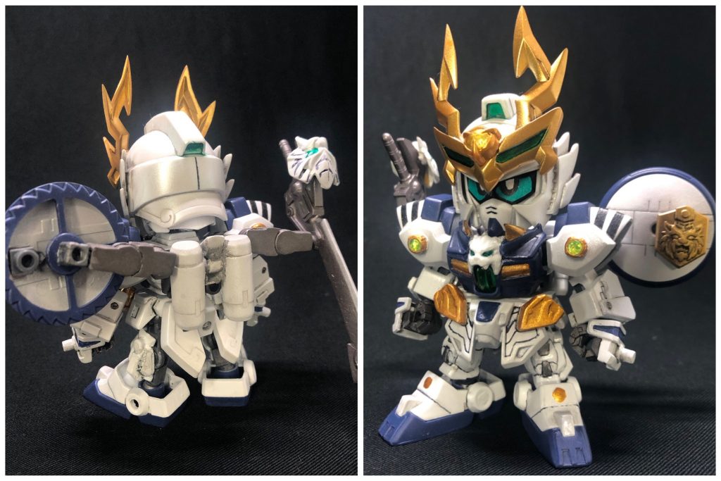 虎暁ブロッサム---西のとある国で一つの噂が広がっていた。国中の強者達を次々と倒して回る漢(おとこ)がいる、と言うのだ。その漢は剣や槍などの武器を持たず、拳のみで相手を圧倒していたらしい---。そう、その漢こそ、白き虎の如き豪傑『虎暁』(こぎょう)である。虎暁は自らの拳が最強だと信じており、それを証明する為に各地の強者に次々と喧嘩を売って戦ってきた。そんな彼も白虎刀(に封印された神獣)に選ばれたことで、蚩尤を封印するという大きな戦いの流れに巻き込まれていく…。・演者について再び四神モチーフを作っております。HGの時と同様に白虎担当からスタートです。まずは演者にGP00ブロッサム…というマイナーな機体をチョイスした経緯から。虎暁が孫権と繋がりがあるようなので0083系を検索してたらブロッサムを見つけ、そんなんいるの⁉︎GP系の先祖的な存在だし適役だな、即決！…となりました(この時GP00の存在を初めて知りました。)・造形について背中の装備が特徴的なブロッサム。剣と盾の配置でバックパックを再現し、あとは似ているパーツの選定やギミックの調整などを繰り返しました。なるべく孫家やその配下の面々のパーツを使用する、という変なこだわりもあります。