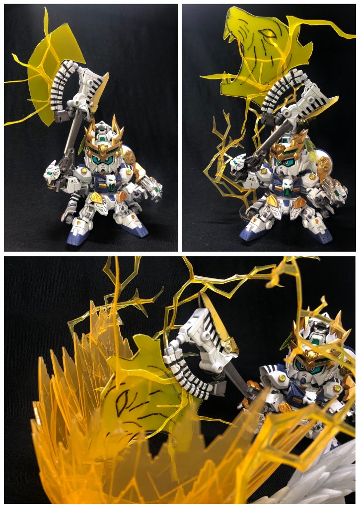 大斧『大目牙虎雷斧(おめがどらいぶ)』獣神形態でのメイン武装。白虎刀を強化し、刃を闘気と雷で形成した大斧。常人では持ち上げることも出来ない程の重さだが、虎暁の身体能力と弩虎の強化により片手で振り回すことが可能。刃を虎の形に変化させた一振りは、落雷と同等の破壊力を持つ。