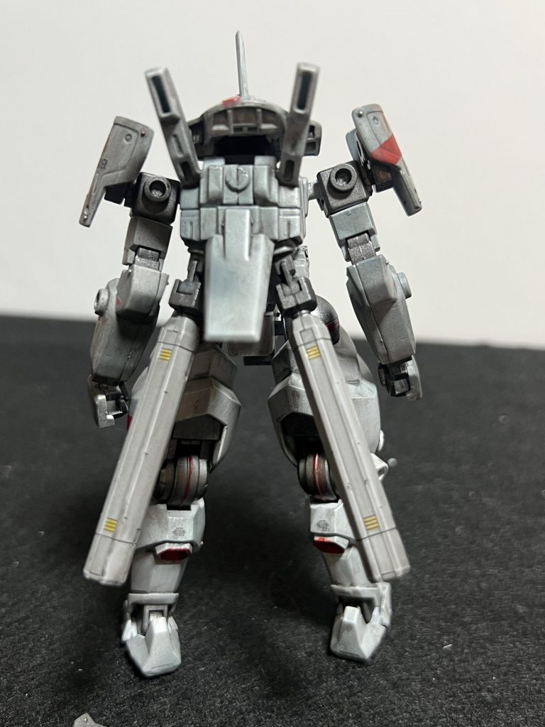 漢は背中で語る。