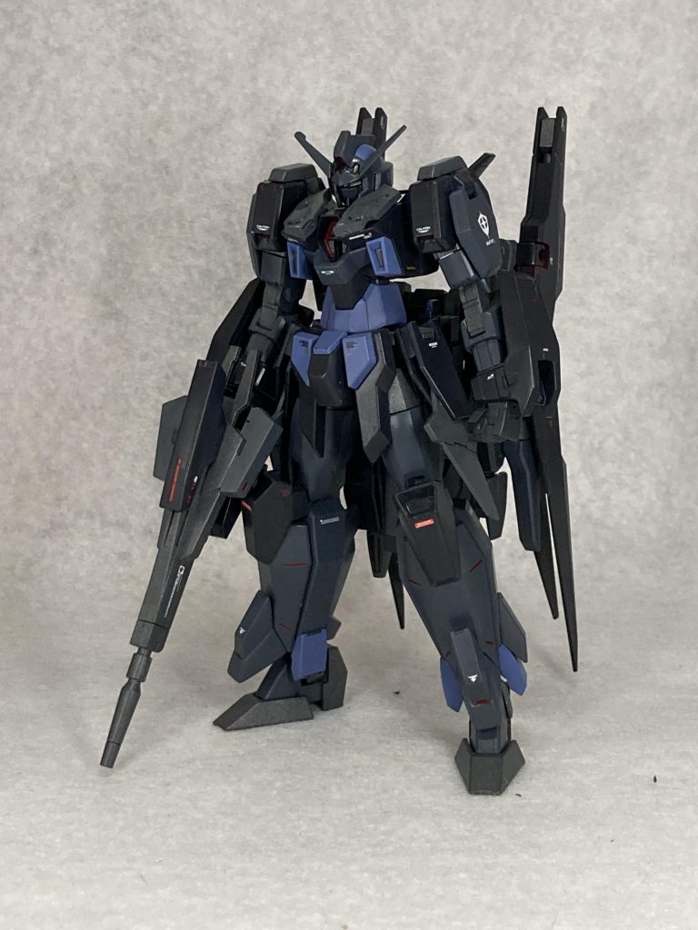 HGのAGE-2をベースにウェアを中心に改造改造のモチーフはマクロスのVF-19A塗装は同VF-19Aのデュラハンズ所属機