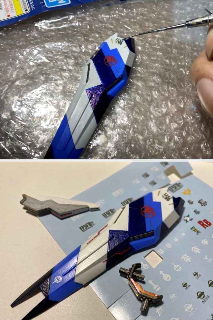 また知人から頂いた逆シャア用のデカールがあったため、それも活用させてもらいました。デカールを貼る際、盾のシールをすべて剥がして盾中央＆上部にも濃いブルーを追加して色合いを自然な感じにしてみました。