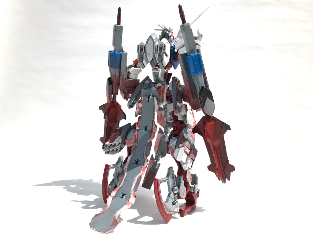 Front/Rear.ここからは製作したガンプラについての説明．ベースキットはhgガンダム・バルバトス．バルバタウロスの余剰パーツ、アームアームズの斧、スラスター、フラウロスの砲身(小型)などを組み合わせて製作しました．フレームパーツに手を加えて、機体のシルエットが女性型に見えるようにしてみました．メイスはフラウロスの砲身に差し込んでガントレット/バンカーメイスとして使用可能です．