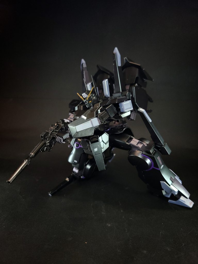 IIネオ・ジオングの猛攻に晒されるナラティブガンダムのコア・ファイターを救援するため、新サイド6のヘリウム3備蓄基地へ向けて高速移動中のガランシェールJrの甲板上からビーム・マグナムによる超長距離狙撃で援護射撃を行い、アーム・ユニット1基を撃破する[注 6]。