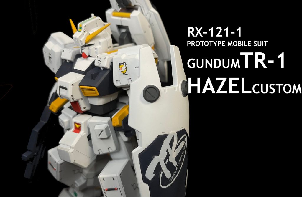 文字を入れての撮影かなりそれっぽくできて満足です使用塗料　クレオス→(C) ガイアノーツ→(G)白:アルティメットホワイト(G)黄:橙黄色(G)赤:フレイムレッド(G)ダークブルー:ティターンズブルーⅠ(C)＋ティターンズブルーⅡ(C)フレーム:メカサフスーパーヘヴィ(G)バーニア:ウイノーブラック(C)→メッキシルバーNEXT(C)写真ではそこそこいい出来だと思いますがスミ入れでパーツを割ってしまったり、スミの拭き取りミスがあったり、隠蔽力の低い赤や黄などの下地に暗色を使ってしまったりと反省点はかなり多いです