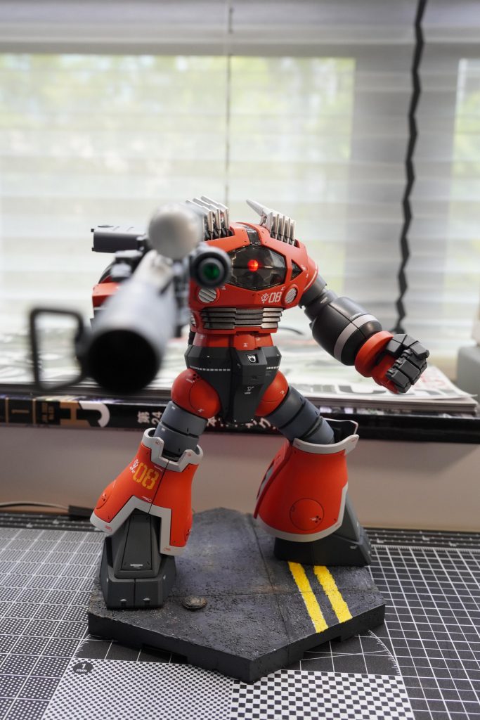 Equipped with modified right side fist to hold a Sinanju Bazooka like a pistol