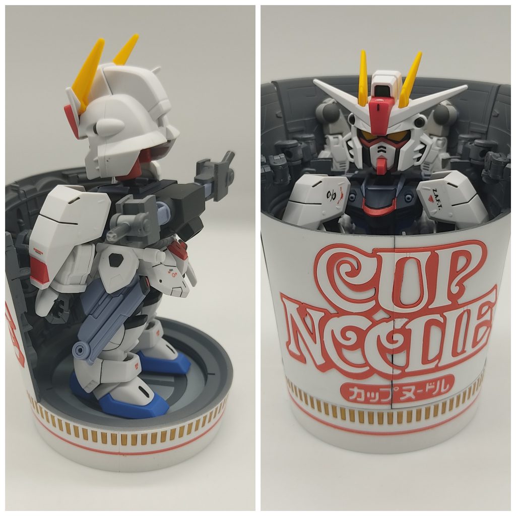 腕を前方に畳み、合わせたパーツを本体側に畳みます。台座に固定し、変形させた翼を取り付けます。