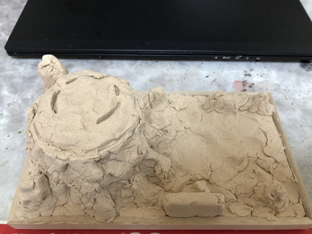 100均でフレーム、紙粘土、発泡スチロールを購入し、適当に台座作成。