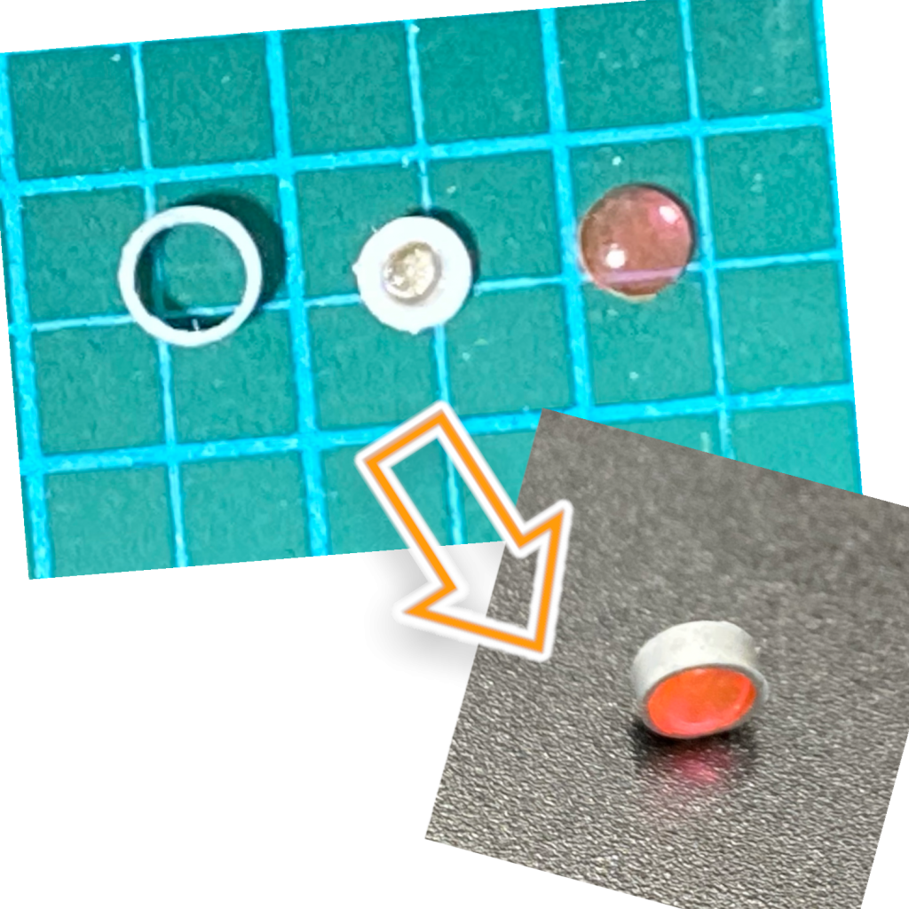 モノアイはプラパイプに2mmのネオジム磁石を嵌めたものを底に、蛍光塗料を塗ったHアイズを乗せ、一回り大きいプラパイプで囲みました。モノアイレール内側にもネオジム磁石を入れレールを挟んでペタ留めしているだけなので、気軽に位置を変えられます。