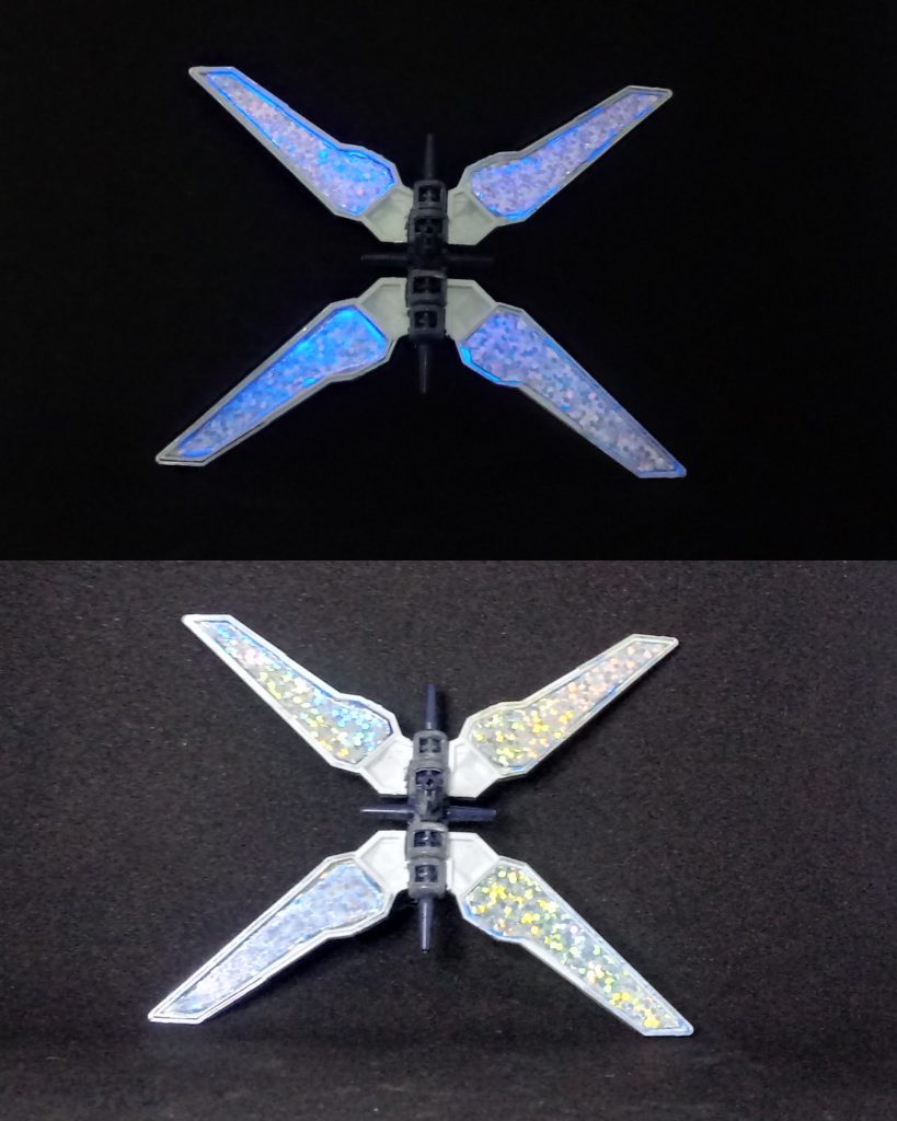 ルナ.リフレクターユニット(ブラックライト使用前後)ホログラムステッカーにUVカラーを塗るのは大胆な試みですが、試す前に心配していたのは、UVカラーがホログラムステッカーを覆い、反射効果が失われるのではないかということです。 この効果を維持したい場合は、UV カラーを少なくする必要があるかもしれませんが、UV が少ないと輝きが足りないかもしれません...幸いなことに、ホログラム ステッカーは日光の下でも光り、UV ライトの下でも色が変わる可能性があります。