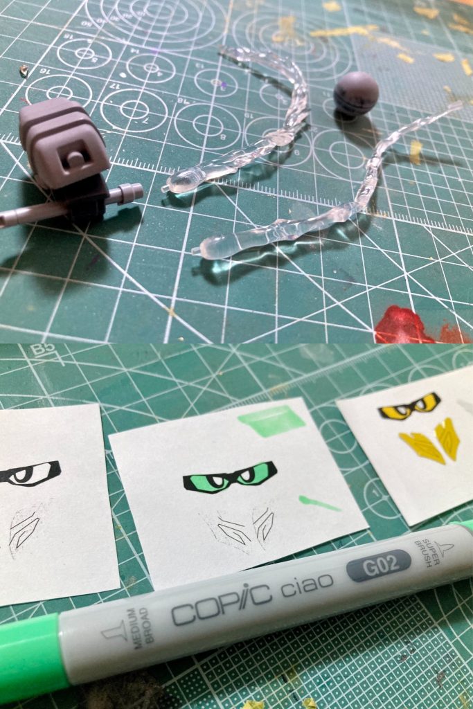 諸葛亮フリーダムの眼は黄色シールだったので、許褚ボルトの緑色になるよう白黒コピーした台紙をコピックG02で塗った上にセロテープで保護し、裏側に両面テープを貼って切り出したものを使いました。蒼翔記での許褚は素手か投石で交戦していたため専用武器の存在は不明ですが、今回は演者MFに準拠してグラビトン・ハンマー状の武器と炸裂!ガイアクラッシャー風のエフェクトパーツを付属させました。