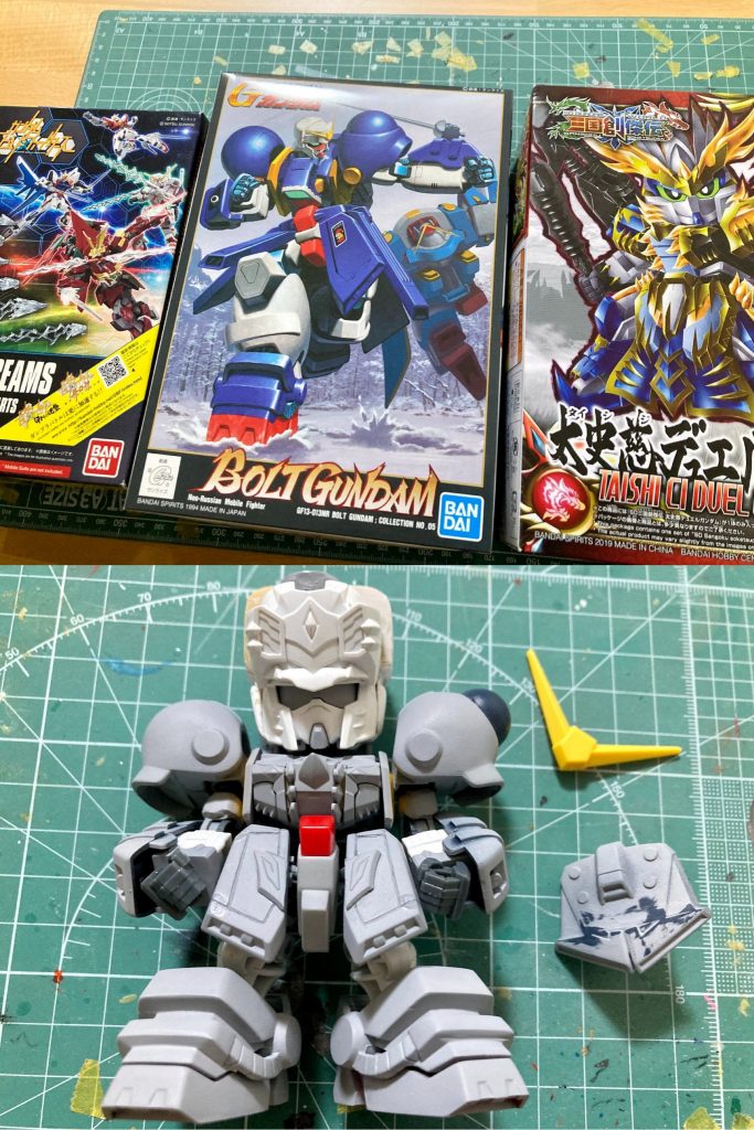 ベースキットは創傑伝キットの中で最も体型が太ましく思われた太史慈デュエルガンダムを使用し、旧キット1/144ボルトガンダムから特徴的なパーツを取り入れて造形しています。