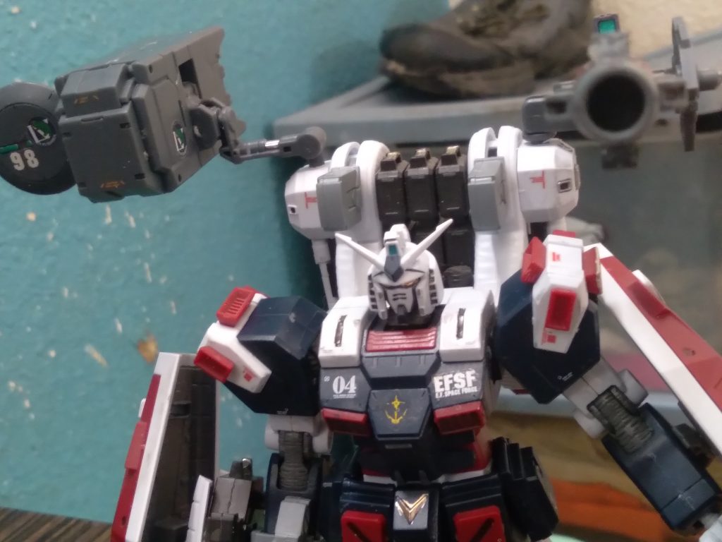 I removed the old pegs and drilled a 3mm hole. Then mounted the kotobukiya missile pod and radome set. The other side is a custom cannon made from 30mm parts and veetwo weapons part. I also removed seam lines and added decals