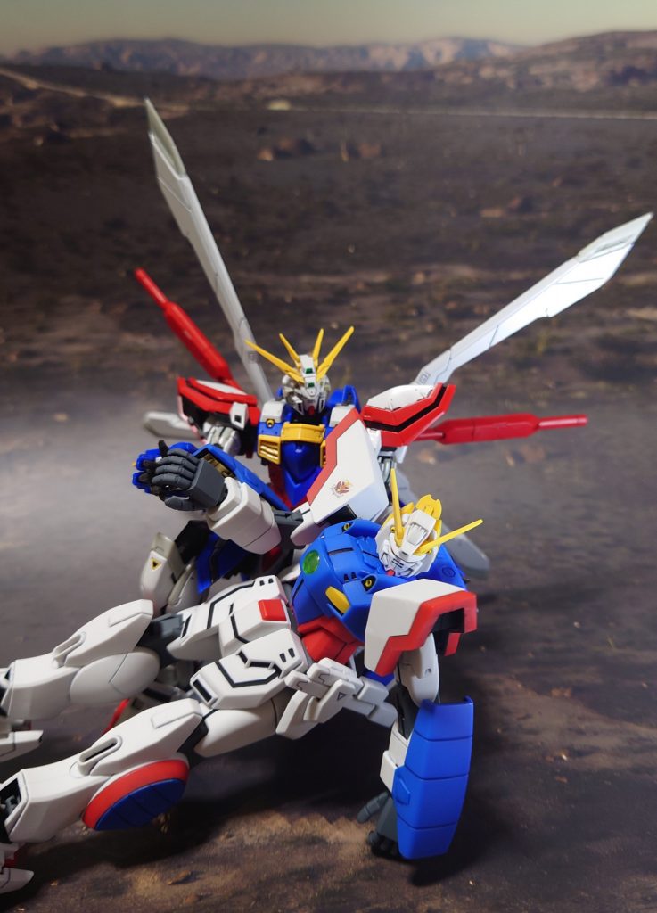 傷付き倒れたシャイニングガンダムの闘志を継いで、ゴッドガンダム立つ。