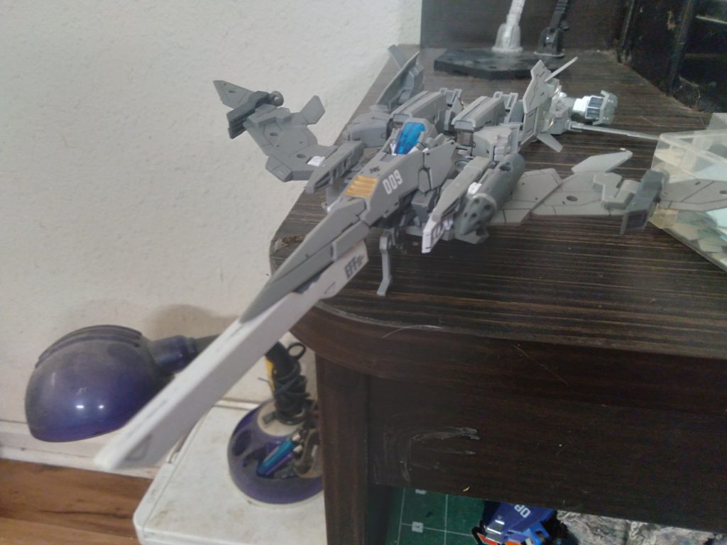 It has a transformation into a mobile suit mode. In the fighter mode, it can use the mega beam launcher in front to fire at enemies. There are 2 multi port missile launchers on either wing that can be loaded with different types of missiles. 