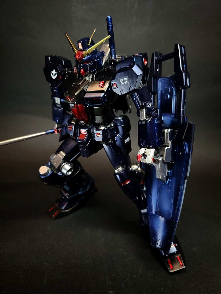 ブルパップ・マシンガンジム改などの主兵装である90mm口径のプルバップ式マシンガン。試作2号機の追撃戦以降の地上戦で使用している。第3話の模擬戦ではペイント弾を使用。ビーム・サーベルバックパック上部に2基装備する。コア・ファイター時のビーム・ガンと兼用装備になっている。ビーム・ガンバックパックにマウントしたビーム・サーベルはビーム砲として使用可能。主にコア・ファイター時に使用されるが、火力は低く威嚇に使える程度。火器としての性能向上はフルバーニアンへの改修を待つ事になった。