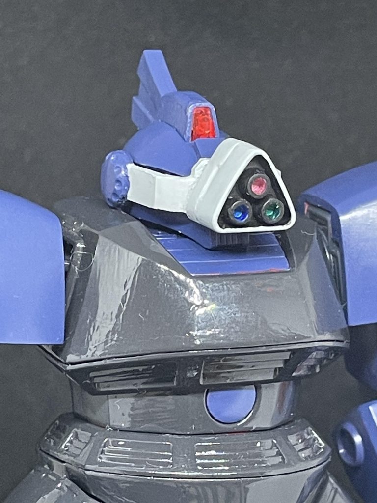 頭部はシャア専用のツノ付きと、キャノン用頭部にフリッパーのカメラモジュールを取り付けましたジョニー・ライデンの帰還に登場するジャコビアス機よりフィードバックしたという設定。