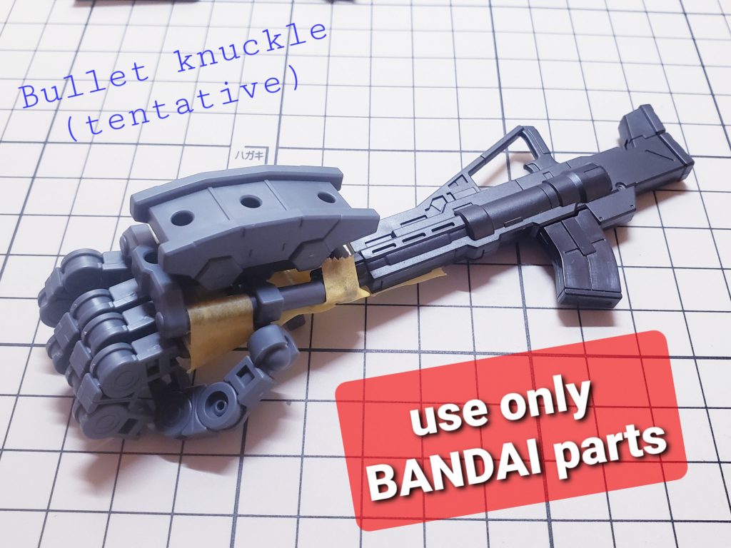 バレットナックルの構造アイデア出しのためテープ仮固定をしていたときの写真です。ビルドカスタムシリーズのガンプラパーツが使われているのがわかりやすいと思います