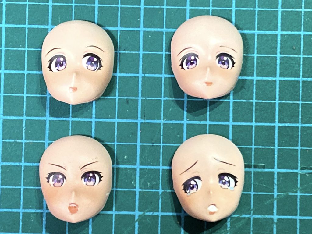 フェイスパーツは4種用意しました。オプションフェイスにはタンポ印刷が無いので、瞳はデカールです。平面で見た印象と貼った印象が全く異なり、絶望して投げ出したくなりましたが、メガネをかけたら気にならなくなりました。不思議です。