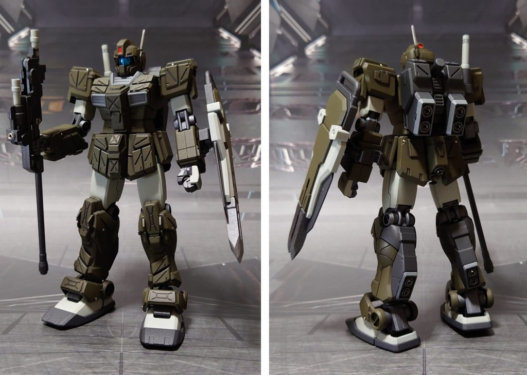 ジム・ストライカー、前後ろ。ディティールアップは市販のプラパーツ貼り付けと、金属パーツ埋め込みで実施。色分けは差し色のオレンジを捨てて、お気に入りのミリ風塗装。■塗装工程緑:黒サフ→オリーブドラブ→つや消し白:黒サフ→ガルグレー→つや消し黒:黒サフ→連邦グレー→つや消しグレー：黒サフ→ニュートラルグレー→つや消し関節等グレー:黒サフ→ブライトガンメタル→つや消しシールドスパイク部:黒サフ→ガンメタル→先端側にシャインシルバー→つや消しその他部分塗装、墨入れ:ガンダムマーカー各種(つや消し前に実施)ビームサーベル刃：根本にMSホワイト→先端にメタリックレッド→蛍光ピンクセンサー類:付属のシール、市販のシール素材を使用(トップコート後に実施)