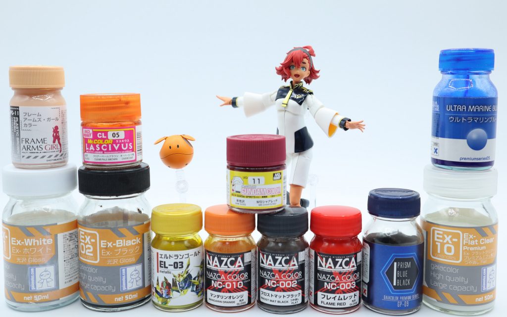 スレッタに使った塗料一覧です😄肌の塗装ですが、FG-11→クリアブラウン塗ってからFG-11を薄く砂吹きしたらいい感じになりました👍サフは金色部分は黒、肌と服は白使ってます、服の黒部分とブーツはサフなしで塗装❗