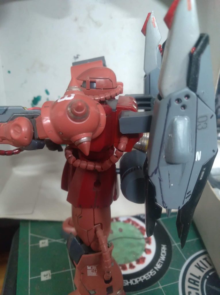 I used some sub arms to mount the phantom boosters. The cannon is from the gunner zaku warrior. I also added an energy tank from my parts box. Along with a custom made cable.