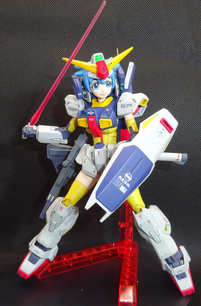 とりあえずビームサーベルで1枚　エナメエル溶剤の威力を舐めていました　墨入れでサーベルの基部が真っ二つに(*´д｀*)　何とか修復　ナミさんの腰パーツをボールジョイントに変えて脱着可能にした相乗効果で、若干腰を捻る事ができます　これはおすすめ改造です　しかしバルカンポッドを装備すると一気にMKｰⅡっぽくなるよね　頭部とバルカンポッドのみSDガンダムMKｰⅡのキットを使用　頭部を切り刻み貼り合わせ盛っては削り　トサカ部分はエッジを落として丸味を持たせました　逆にブレードアンテナは裏打ちして少しだけシャープに削りました　バルカンポッドは厚みを持たせ銃口やセンサーなども製作してバッチリディティールアップしました