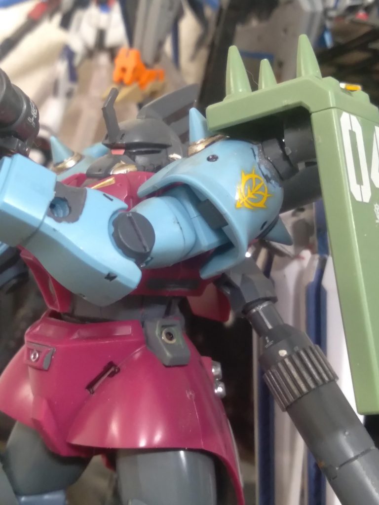 Here shows a little bit of how I was able to get the shoulder shield attached. I also made a commander antenna from plastic board