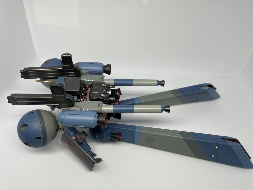 複合型のバックパック。元のバックパックに大型ブースター2基とプロペラントブースター2基、使い捨てのサブブースター１基を追加。腰部にも小型ブースターとプロペラント基部にもサブスラスターを増設。