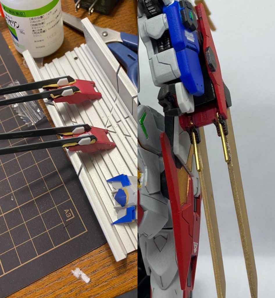 手甲フラウロスの手甲パーツに、何をとち狂ったのかGNダイバーソードを半分にぶった切りしたものを接着しています。接着面確保のためにエポパテを挟んだりプラ板で作ったディテールパーツをソード左右に貼ったりとしましたが、それでもやや不安が残ったため、最終的にはソードと手甲の接着に加え、手甲のツメの中に通した真鍮線をソード底面に沿わせて接着(写真2枚目)、合計2点で安定させています。