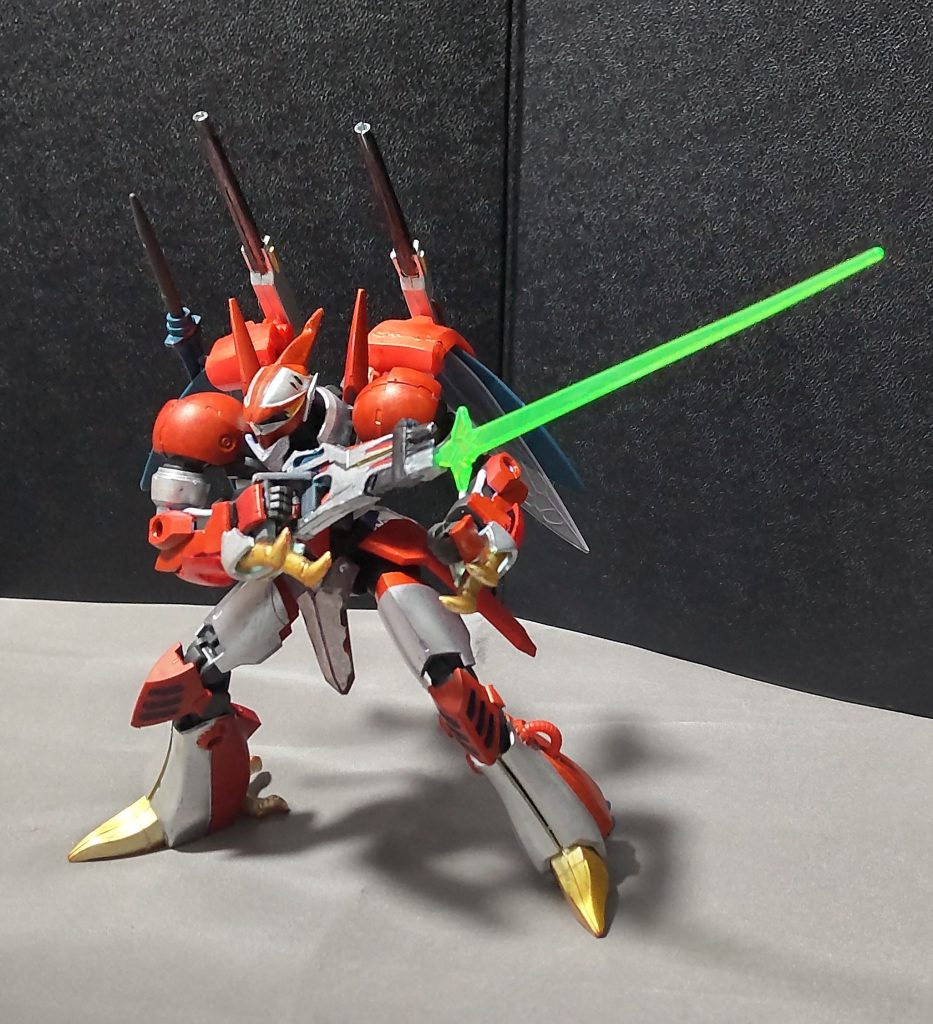 ・オーラ・ビームソードオーラソードライフルの先端部分の下部より、銃剣のように展開する。※原作ではオーラソードとの鍔迫り合い時にビームソードがへし折られて割れるように砕ける描写がある。