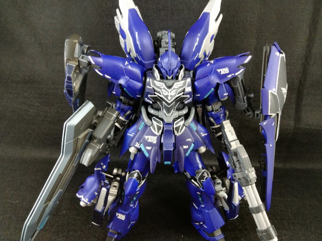 ※ネタが混じってます!おおおオフィシャルではございませぬぞぉぉぉ!シナンジュBを企画した技術者が、性懲りもなく提案した強化プラン(この時点でとある構成員の額には青筋が見え隠れしていたとか…)ラプラス戦争が長引き、ユニコーンガンダムにも強化プランが…という情報を入手した袖付き。ならばシナンジュにも強化を!と提案された。プランの内容以前に、色についてこっぴどく指摘されたことは言うまでもない。そもそもネオ・ジオングがあるから不要、と努めて冷静に対応する構成員。技術者はこう主張する。ある迷信によると、巨大化は敗北率が高いのだと。フラグだと。験担ぎに大きくならない強化プランが必要でs「大佐がガンダム如きに負けるわけないだルオオオオ!?」…と我慢ならなくなった構成員がそこにいた。アンジェロ(もしかしたら大佐も)の敗因はまさかこの精神的疲労では…と大真面目に考える人までいたとかいなかったとか。