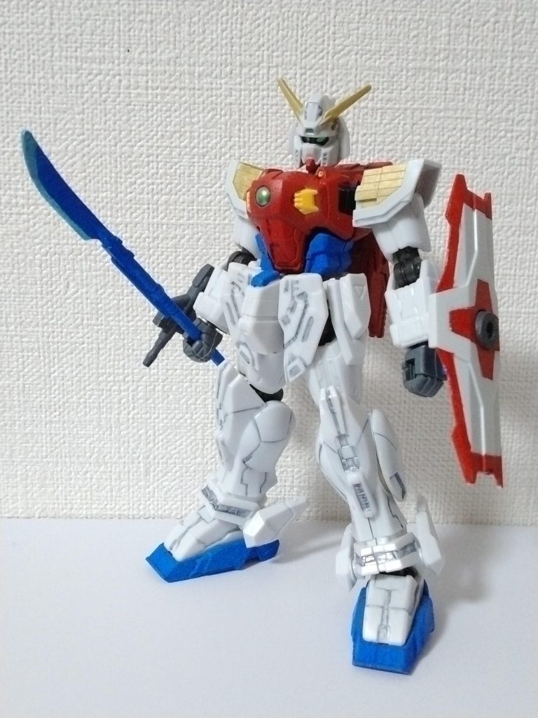 Gフレームのシャイニングがほぼ1/144と聞き、たまたま旧キットのライジングガンダムを店頭で見掛けたので、ついやってしまいました。制作費はGフレーム750x2+旧キット500の約2k。(塗料・ジャンクのポリキャップ等含まず)頭・肩・ふくらはぎ・武装類などを旧キットより移植しています。基本は成形色、色違いの部分のみファレホ筆塗りしてガンマカスミイレのザックリ仕上げです。