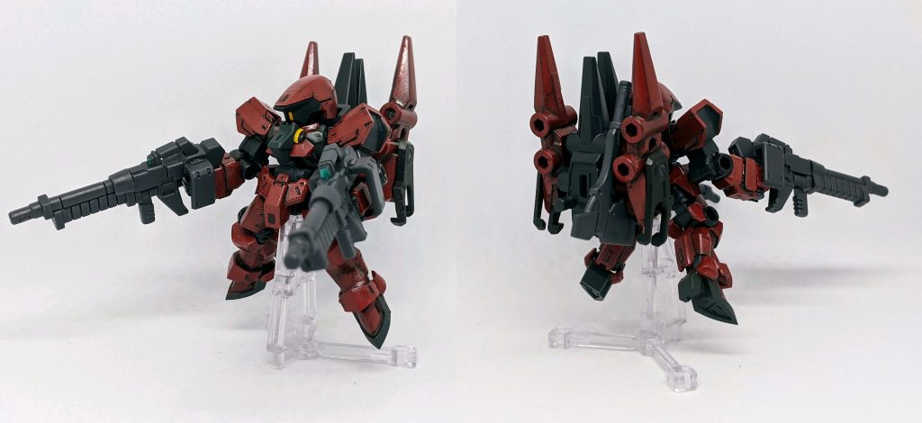 「大型のブースターユニットを装備したテスト機のグレイズ、このブースターのデータが後のキマリス専用の高機動ブースターに活かされることになる、なお装甲が赤く塗装されているのは単純に赤色塗料が有り余っていたが故に使ったからである。」ブースターを三日月グレイズに移植したので他の余剰パーツを組み合わせて大型のブースターを装備させてみました。