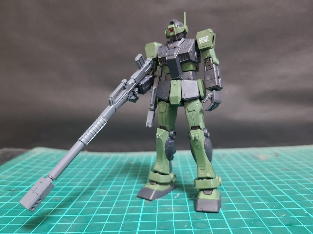 ビリジアンハウンド隊によって運用されているジムに狙撃ライフルを装備した仕様。本機には冷徹な性格ので正確無比の狙撃能力を持つ「ハウンドσ」が搭乗する。武装はジムライフルの試作型を改造した独自の狙撃用ライフル、腰にE-2ビームガン、バックパックにはスモークディスチャージャーを搭載している。