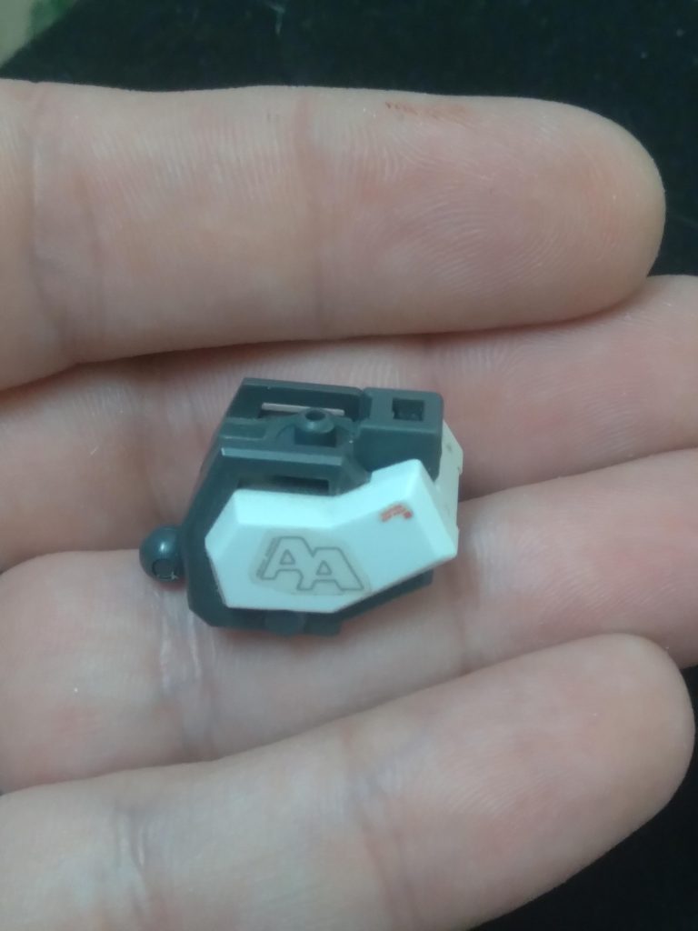 I glued the part to the gray of the shoulder