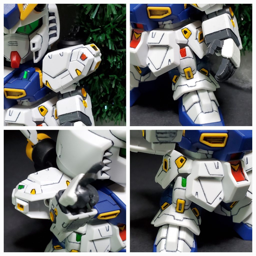 福岡νガンダム。ロングレンジフィンファンネルの代わりにツリーを背負っています。ピース手に改造しています。ほか、部分塗装や合わせ目消しを行い、現物には肩にもライトがあるのでモールド追加して塗装しています。