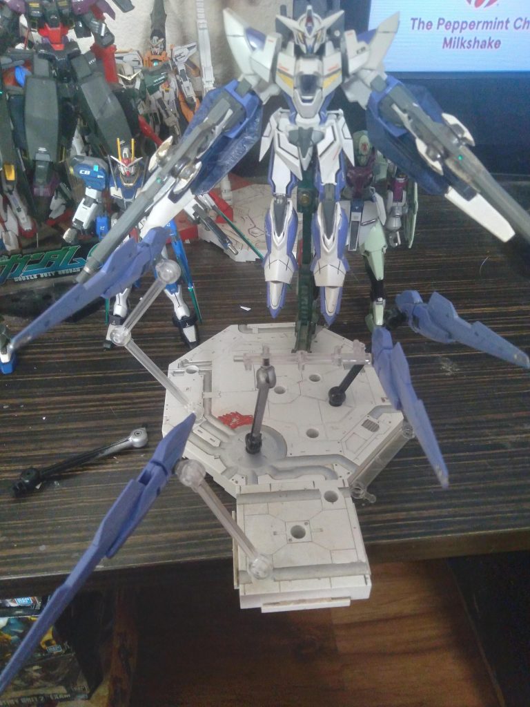 The 1.5 Gundam FALO (fully armed load out) is the first federation made Gundam. It was built with designs made by prof. Howard, the scientist who defected from celestial being and tried to steal the plans for the gn drives. number of upgrades until the final battle. It starts powered out by a gn drive tau. After it's able to destroy one of the Andromeda Gundams, it takes its drive, unlocking more devastating power. gn shields, 2 gn beam sabers, and 4 gn binder rifles.
