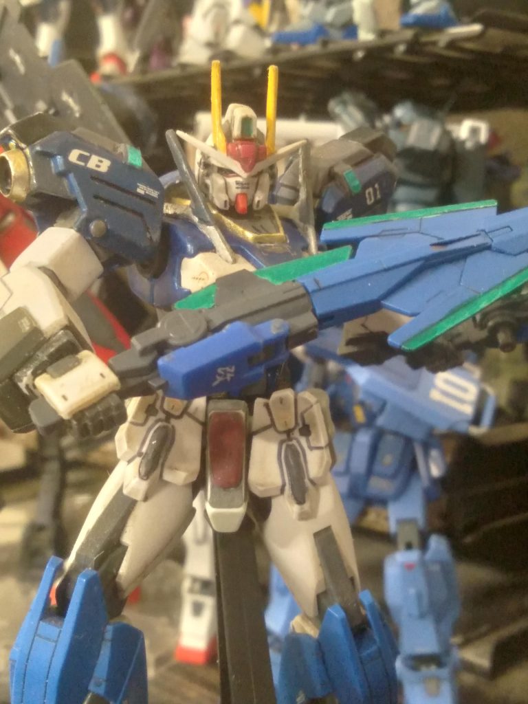 GN-R1 Gundam Gemini. This was the first GN Drive powered Gundam that Celestial Being made. It was made to be a highly mobile, fast striking Gundam. Wielding a pair of GN swords, this machine is the close quarters specialist of the team. Later, it gets the GN broadsword as an upgrade