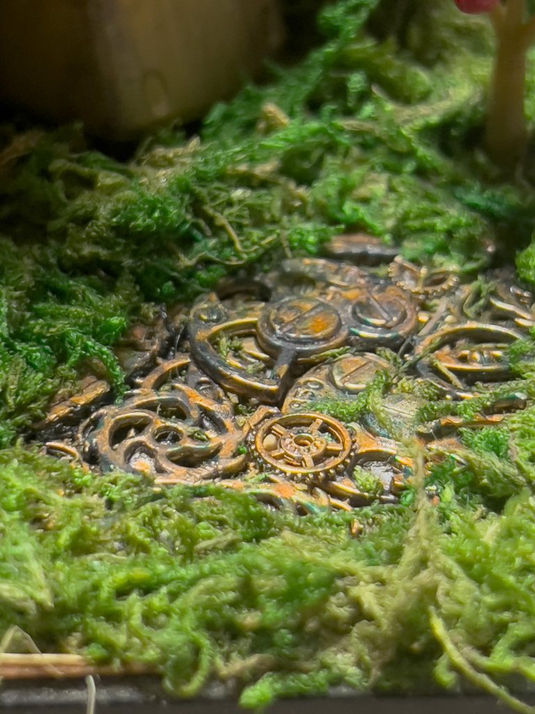 地面から歯車が見えている感じで不思議な雰囲気にしてみました。