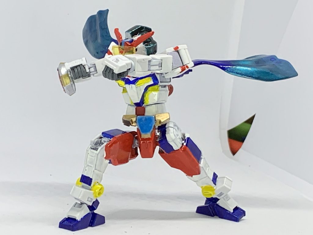 特徴的なマフラーはSDWの斉天大聖孫悟空インパルス闘戦勝仏から取っています。カラーは全てクレオスアクリジョンで赤→モンザレッド、青→ブルー、イエロー→イエロー、髪とマフラーにメタリック青竹色、髪にスモークグレー、その他ガンダムマーカーよりメタリックオレンジ、メタリックピンク、コスモメタブルー、シャインシルバー、レッドゴールド、ニューホワイトを各部使用。