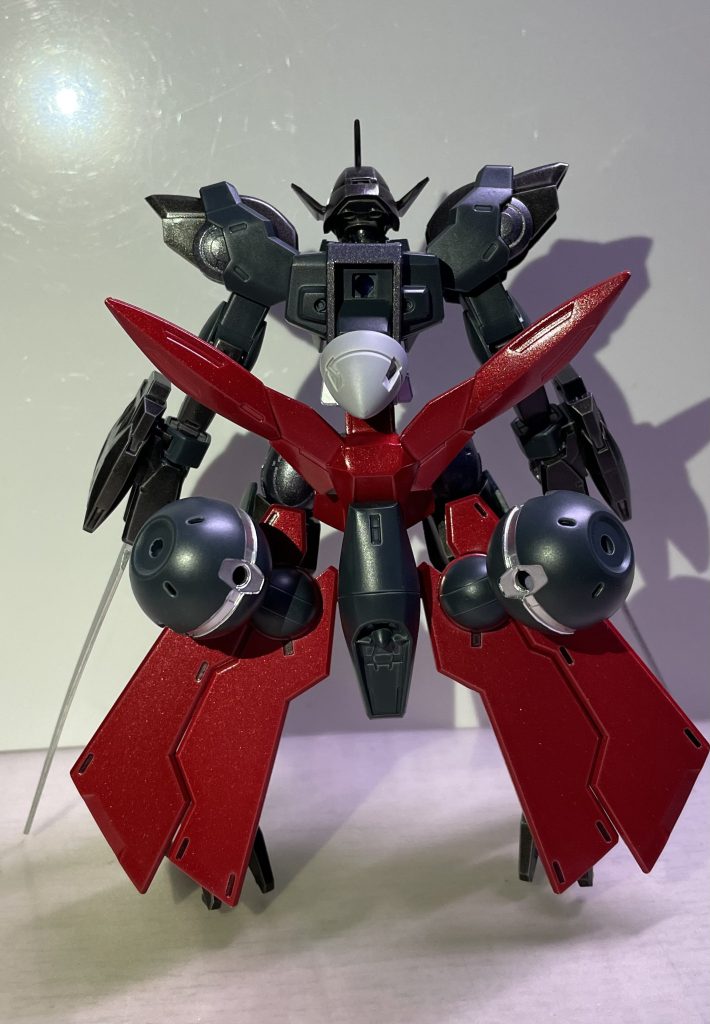 元々あった背部パーツを腰に移動最初に見た時リボンみたいだったので赤く塗装しました背中はストライカーパックをつけられる様にストライクを移植しましたコーン状のパーツはGNドライブです。