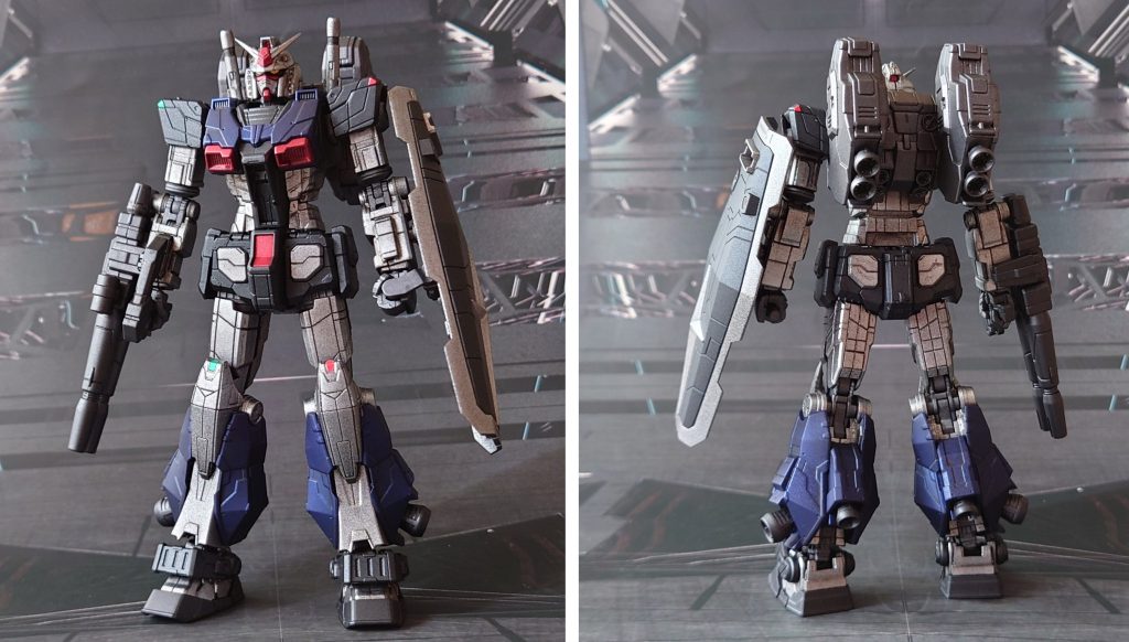 ガンダム高機動型の前後ろ。塗装以外の工作としては、パーティングライン・ヒケ・段ズレの対処、頭部アンテナ尖らせ、市販パーツでディティールアップ。■塗装レシピ銀:黒サフ→シャインシルバー→つや消し黒:黒サフ→メタリックブラック→つや消し青:黒サフ→シャインシルバー→ディープメタリックブルー→つや消し赤:黒サフ→メタリックレッド→つや消し関節等グレー:黒サフ→ブライトガンメタル→つや消し武器・スラスター等濃グレー:黒サフ→シャインシルバー→メタリックグレー→ガンメタル→メタリックブラック→つや消しポリキャップ:PPプライマー→シャインシルバー→メタリックグレー→つや消しビームサーベル刃:根本にベースホワイト→先端にメタリックレッド→蛍光ピンクその他部分塗装、墨入れ:ガンダムマーカー各種→つや消しセンサー類:トップコート後に付属シールを貼り付け