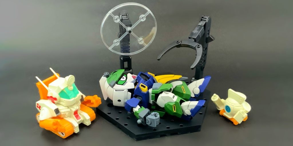 ●パワーアップの為に「力が必用だ!頼む!ガンタンク!」※演出上、『SDコマンド戦記II ガンダムフォース』の『Dr.ガンタンク』と『ナースボール』を配置しています。